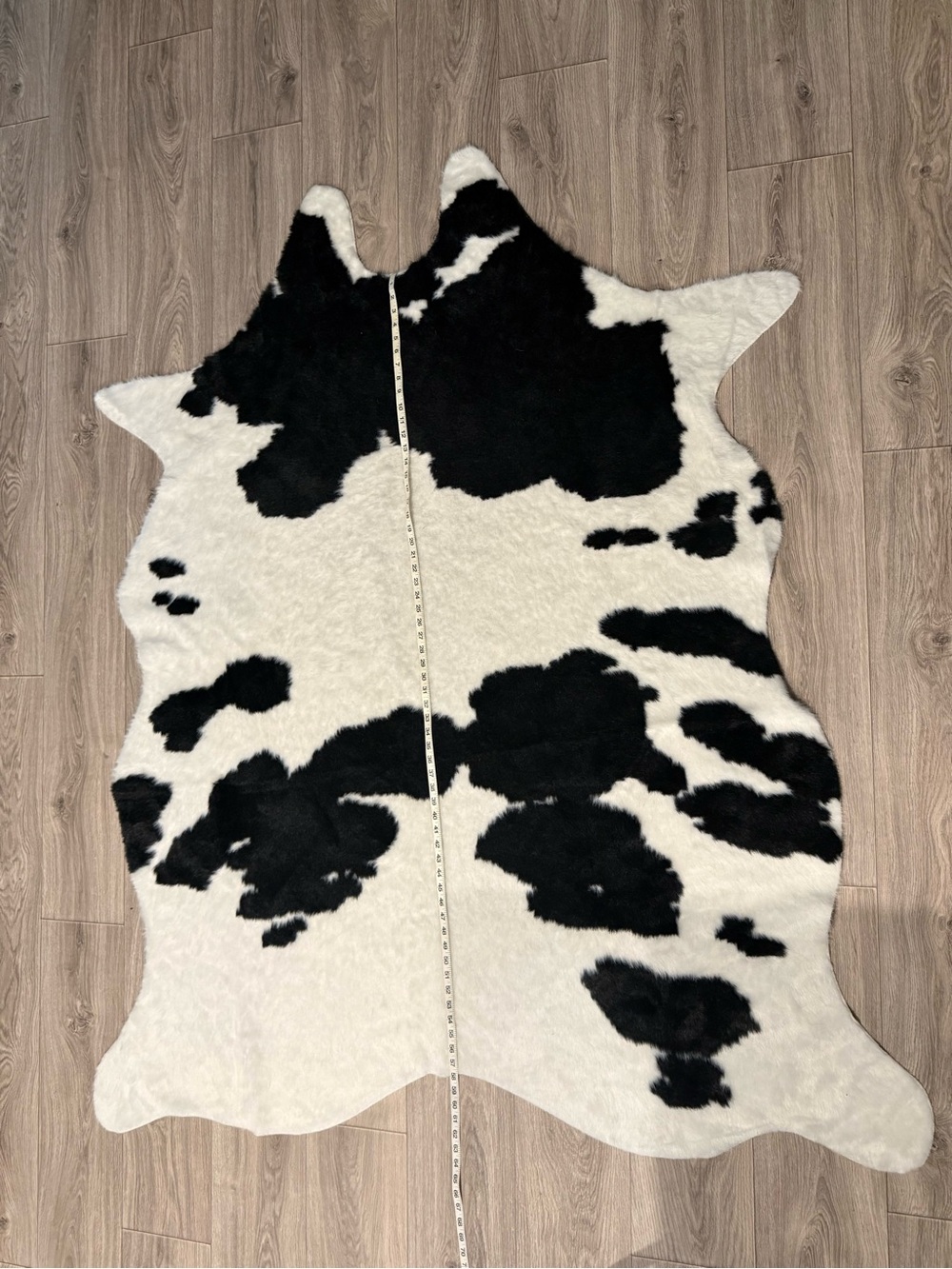 Soft Black & White Faux Cowhide Accent Rug - Home Accents